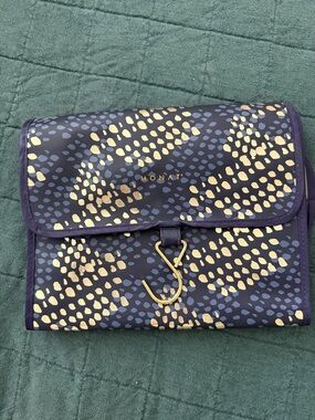 MONAT Foldable Travel Bag in Navy with Gold Dot Print